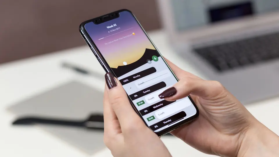 Smartphone with an app open in someone’s hand