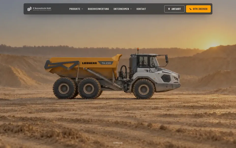 Home page of quarzsandwerke.de showing a dump truck in the sand pit at sunset